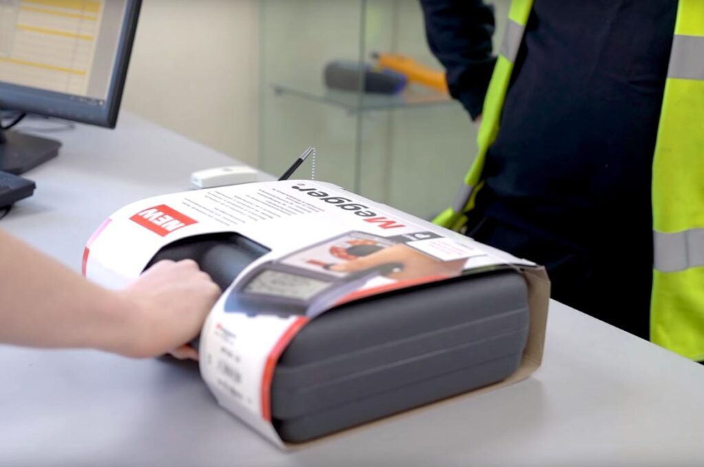 Engineer purchasing a Megger test instrument from a PASS Ltd trade counter