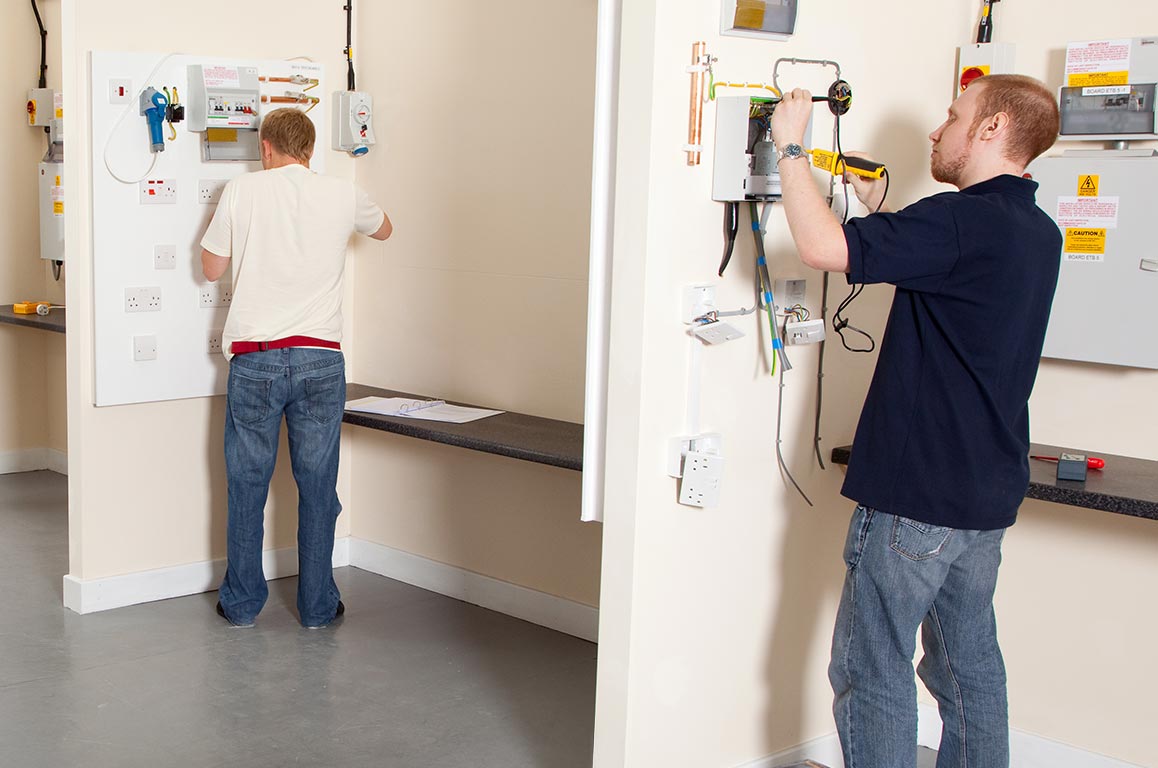 Learners using test boards on an 18th Edition course and PASS Stockton-on-Tees electrical training centre