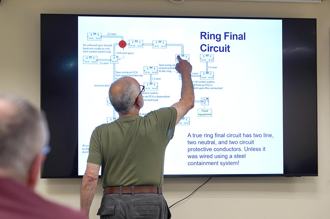 Tutor explaining a ring circuit on a safe isolation course