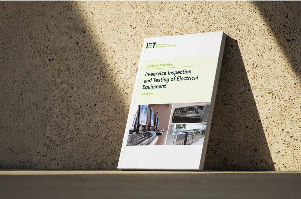 IET Code of Practice book stood against a wall