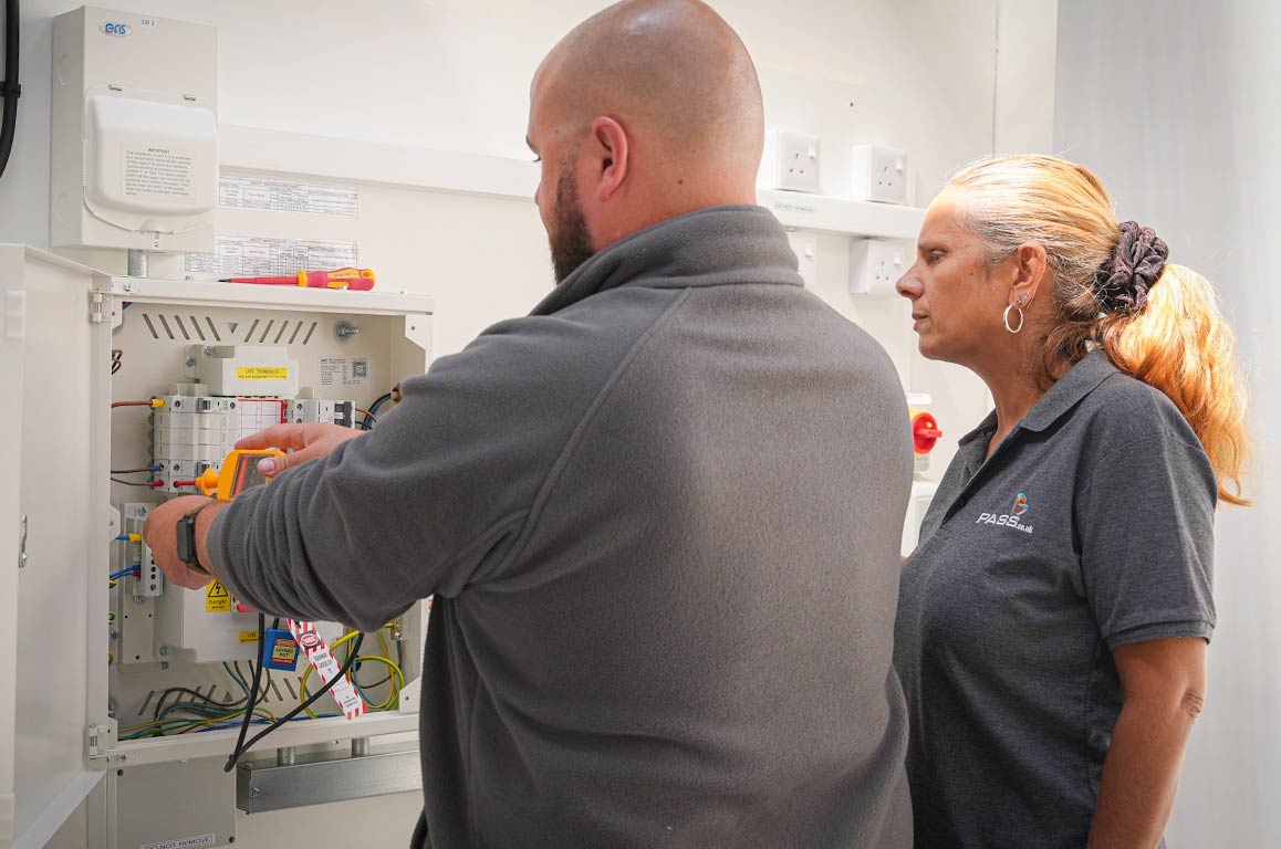 Delegate and tutor training in an electrical bay at PASS Stevenage